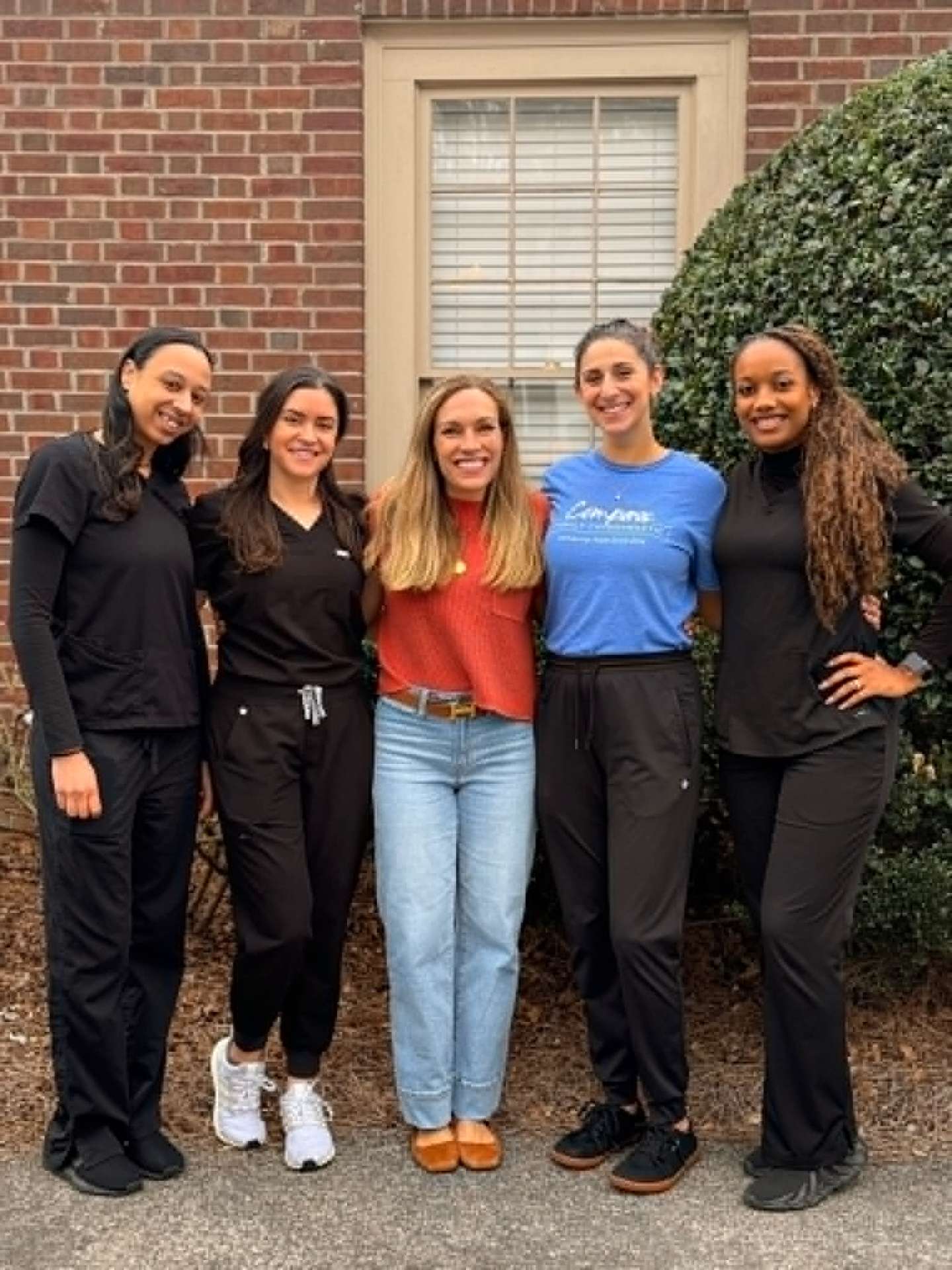 The Compass Family Chiropractic team outside the Dunwoody office